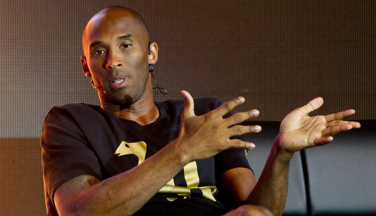 Retired NBA player Kobe Bryant has said he would have protested racial discrimination, kneeling during the national anthem at games, if he were still playing. (AP Photo/Bullit Marquez)