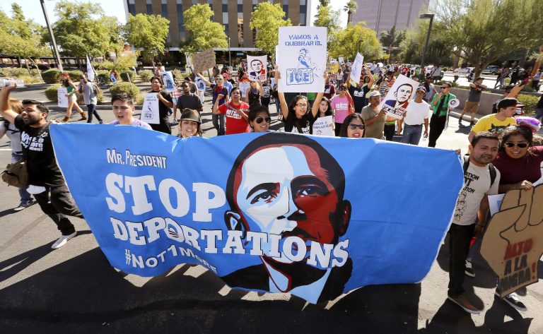 Upset with President Obama's immigration policy, about 250 people marched to the U.S. Immigrations and Customs Enforcement office with a goal of stopping future deportations on Oct. 14 in Phoenix.ÃÂ A surge in the number of illegal immigrants seeking asylum after crossing the U.S. border is likely to become a major area of contention as Washington gears up for another clash over immigration reform.ÃÂ (AP Photo/Ross D. Franklin)