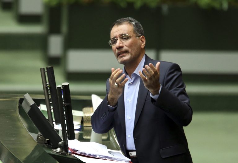 Iran's Science, Research and Technology Minister Reza Faraji Dana speaks in his impeachment in an open session of the parliament in Tehran, Iran, Wednesday, Aug. 20, 2014. In a move led by hard-line lawmakers, Iran's parliament dismissed the science minister on Wednesday over his alleged support for pro-Western voices at universities, dealing a blow to moderate President Hassan Rouhani. (AP Photo/Vahid Salemi)