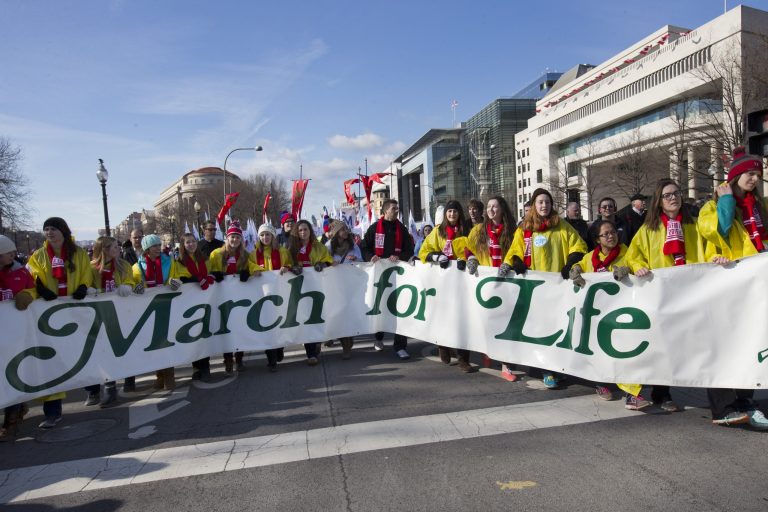 Anti-abortion protesters march on Pennsylvania Avenue in Washington on Thursday en route to the Supreme Court during the annual March for Life. (AP/Jacquelyn Martin)