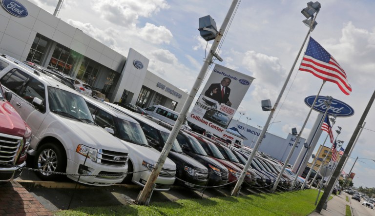 Autos on display at a Ford dealership, Tuesday, Jan. 17, 2017, in Hialeah, Fla.