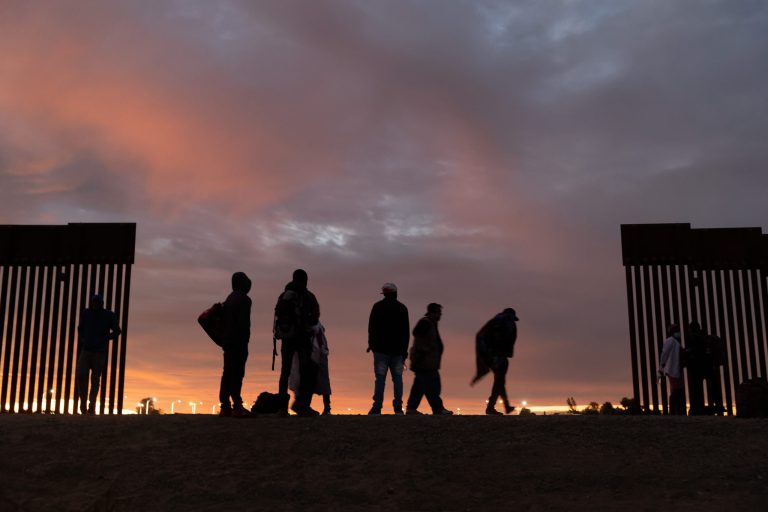 In this Jan. 5, 2016, photo, a U.S. Border Patrol vehicle drives next to a U.S-Mexico border fence in the booming New Mexico town of Santa Teresa. (AP Photo/Russell Contreras)