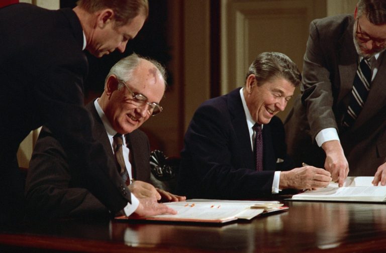 President Ronald Reagan and Soviet leader Mikhail Gorbachev sign an arms control agreement in 1987.