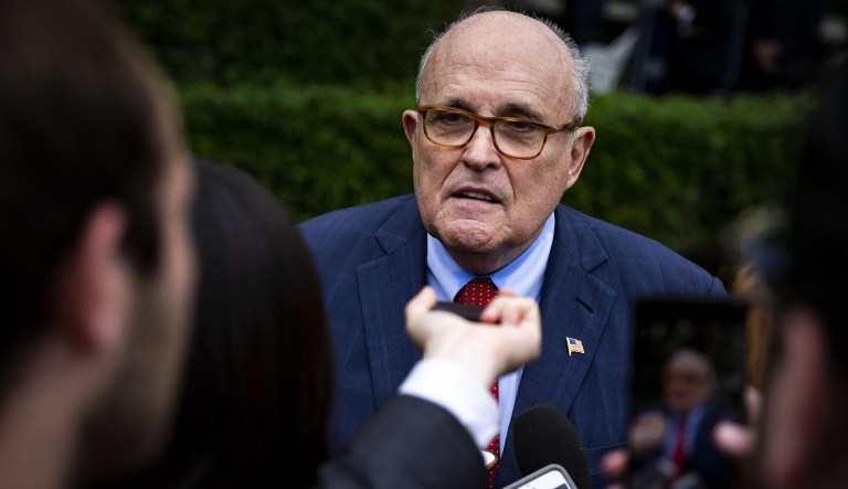 Rudy Giuliani, former mayor of New York, speaks with reporters during the White House Sports and Fitness Day event on the South Lawn of the White House in Washington, D.C., U.S., on Wednesday, May 30, 2018. At the event, President Donald Trump announced the members of the President's Council on Sports, Fitness and Nutrition.