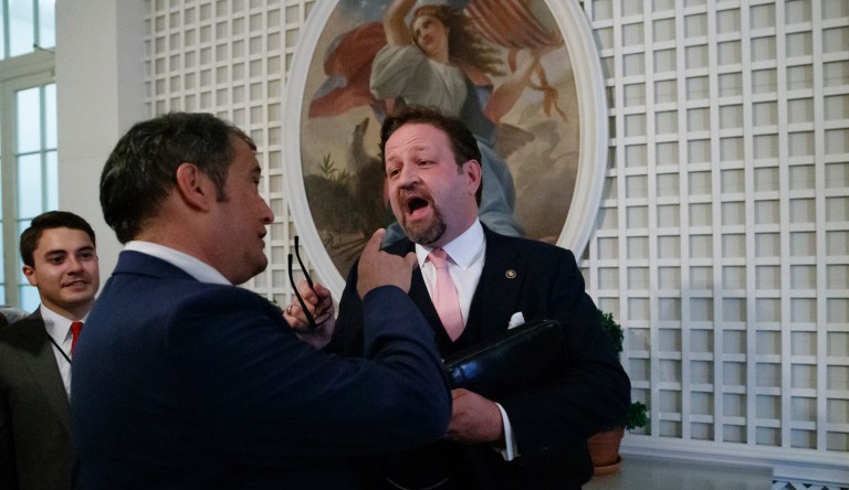 Radio host Sebastian Gorka, right, speaks with Playboy's Brian Karem, center, after President Donald Trump spoke about the 2020 census in the Rose Garden of the White House, Thursday, July 11, 2019, in Washington.
