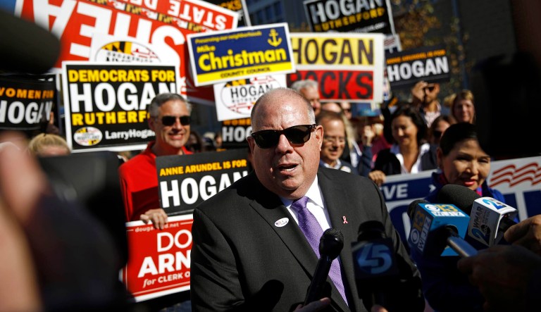 Maryland Gov. Larry Hogan speaks with the news media outside a polling place after voting early, Tuesday, Oct. 30, 2018, in Annapolis, Md. 