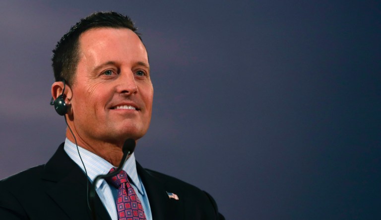 In this photo taken Friday, Jan. 24, 2020, U.S. President Donald Trump's envoy for the Kosovo-Serbia dialogue, Ambassador Richard Grenell listens Serbian President Aleksandar Vucic during a press conference after their meeting, in Belgrade, Serbia.  Grenell urged the new Kosovo government to abolish punitive tariffs on Serbian goods that have blocked negotiations between the two Balkan rivals.