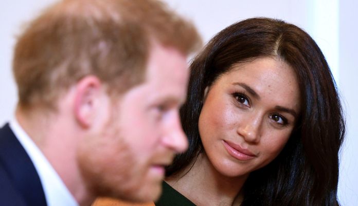 Britain's Prince Harry and Meghan, Duchess of Sussex arrive at the annual Endeavour Fund Awards in London, Thursday, Feb. 7, 2019. The awards celebrate the achievements of service personnel who were injured in service and have gone on to use sport as part of their recovery and rehabilitation.