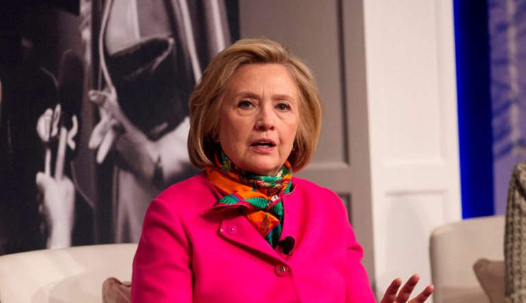 Former Secretary of State Hillary Clinton speaks at the America's First Ladies luncheon at Frederik Meijer Gardens and Sculpture Park in Grand Rapids, Mich., on Wednesday, April 11, 2018. NBC commentator Andrea Mitchell, left, and Lynda Bird Johnson Robb, daughter of late President Lyndon B. Johnson, also spoke.