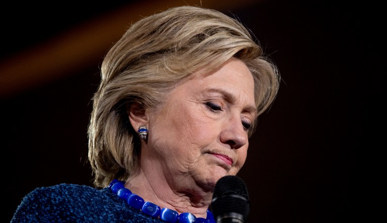 Democratic presidential candidate Hillary Clinton pauses while speaking at a rally at Theodore Roosevelt High School in Des Moines, Iowa, Friday, Oct. 28, 2016.