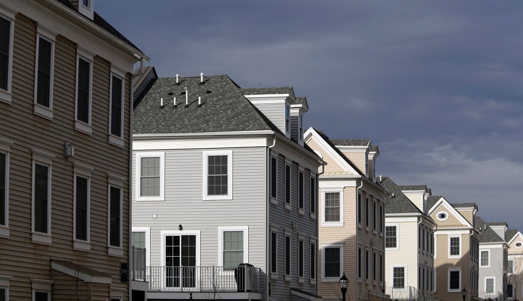 Housing prices hit record as sales slow