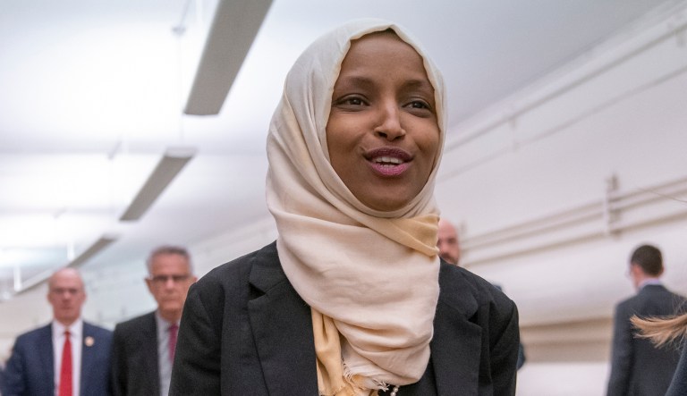 Rep. Ilhan Omar, D-Minn., walks to the chamber Thursday, March 7, 2019, on Capitol Hill in Washington, as the House was preparing to vote on a resolution to speak out against, as Speaker of the House Nancy Pelosi said, "anti-Semitism, anti-Islamophobia, anti-white supremacy and all the forms that it takes," an action sparked by remarks from Omar.