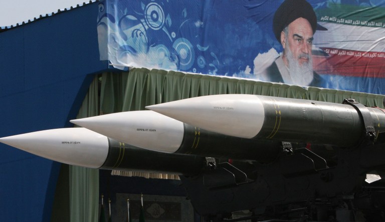 Under a portrait of the late Iranian revolutionary founder Ayatollah Khomeini, Sam-6 missiles are displayed by Iran's Revolutionary Guard, during armed forces parade marking the 31st anniversary of the start of the Iraq-Iran war.