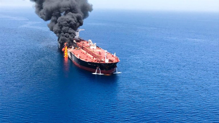 An oil tanker is on fire in the sea of Oman, Thursday, June 13, 2019. Two oil tankers near the strategic Strait of Hormuz were reportedly attacked on Thursday, an assault that left one ablaze and adrift as sailors were evacuated from both vessels and the U.S. Navy rushed to assist amid heightened tensions between Washington and Tehran. 