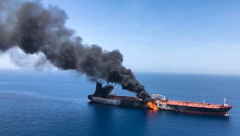 An oil tanker is on fire in the sea of Oman, Thursday, June 13, 2019. Two oil tankers near the strategic Strait of Hormuz were reportedly attacked on Thursday, an assault that left one ablaze and adrift as sailors were evacuated from both vessels and the U.S. Navy rushed to assist amid heightened tensions between Washington and Tehran. 