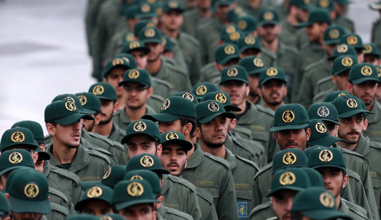 In this Feb, 11, 2019 file photo, Iranian Revolutionary Guard members arrive for a ceremony celebrating the 40th anniversary of the Islamic Revolution, at the Azadi, or Freedom, Square, in Tehran, Iran.