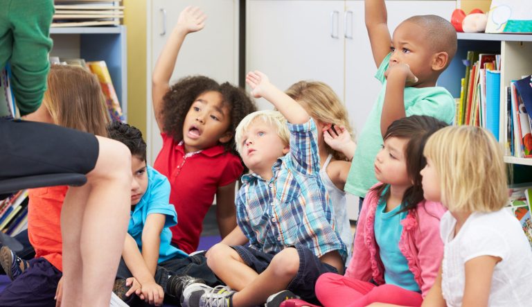 Group of elementary school children in class.