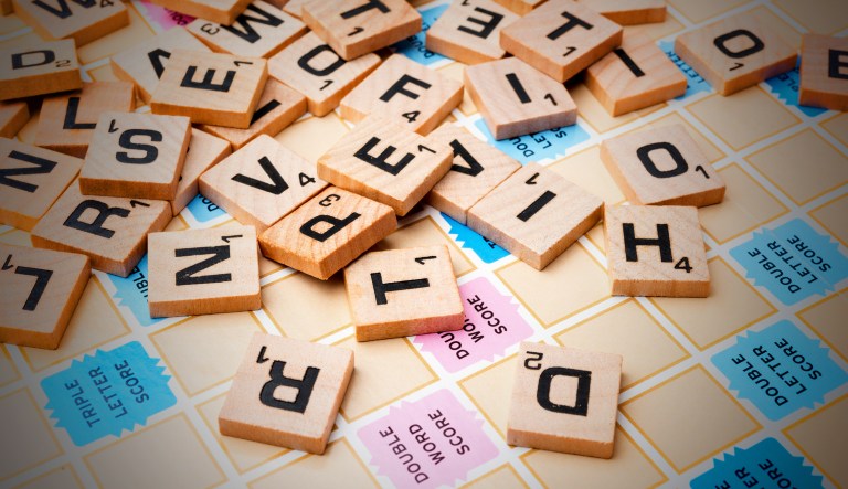 Scrabble tiles are shown.