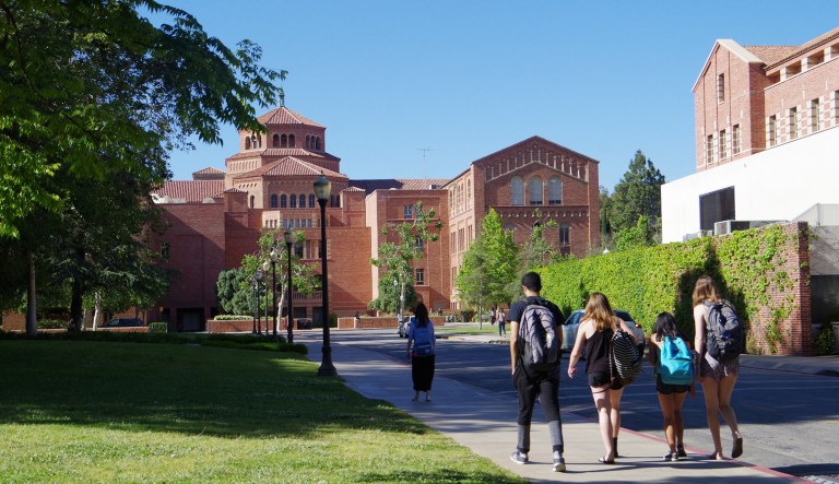 A group of students walking at the University campus University of California, Los Angeles on May 2, 2017.