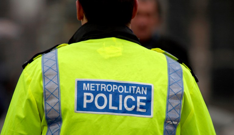 A London Metropolitan Police officer is shown.