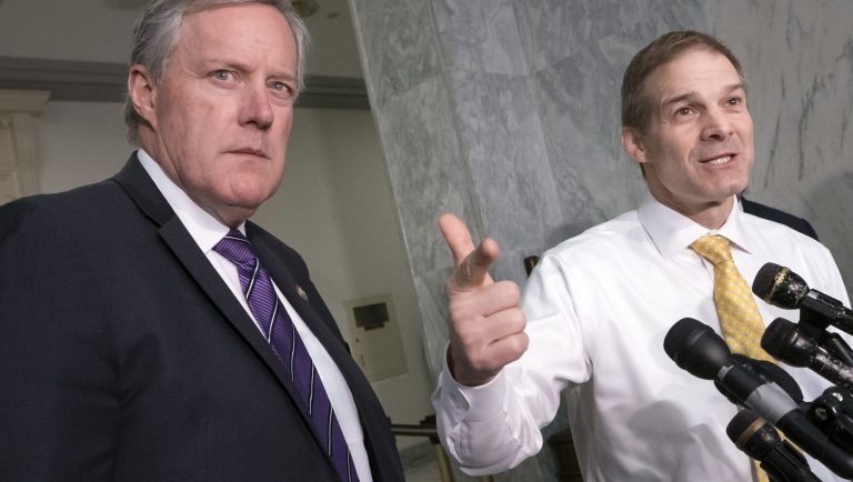 Rep. Mark Meadows, R-N.C., left, and Rep. Jim Jordan, the House Oversight and Reform Committee's ranking member, discuss their objections to House Oversight and Reform Committee Chair Elijah Cummings, D-Md., and his investigation of people in President Donald Trump's administration who were granted security clearances despite "disqualifying issues" in their backgrounds, according to a whistleblower, during a news conference on Capitol Hill in Washington, Tuesday, April 2, 2019. 