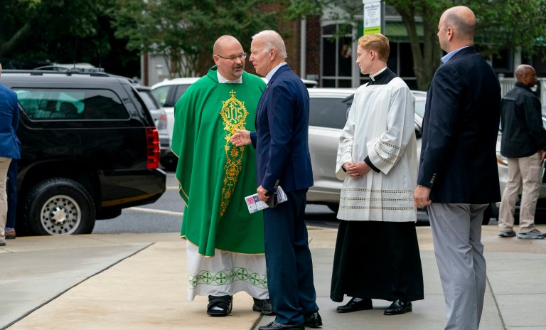 President Joe Biden speaks to members of the church as he leaves St. Edmund Roman Catholic Church in Rehoboth Beach, Del., Saturday, July 9, 2022.