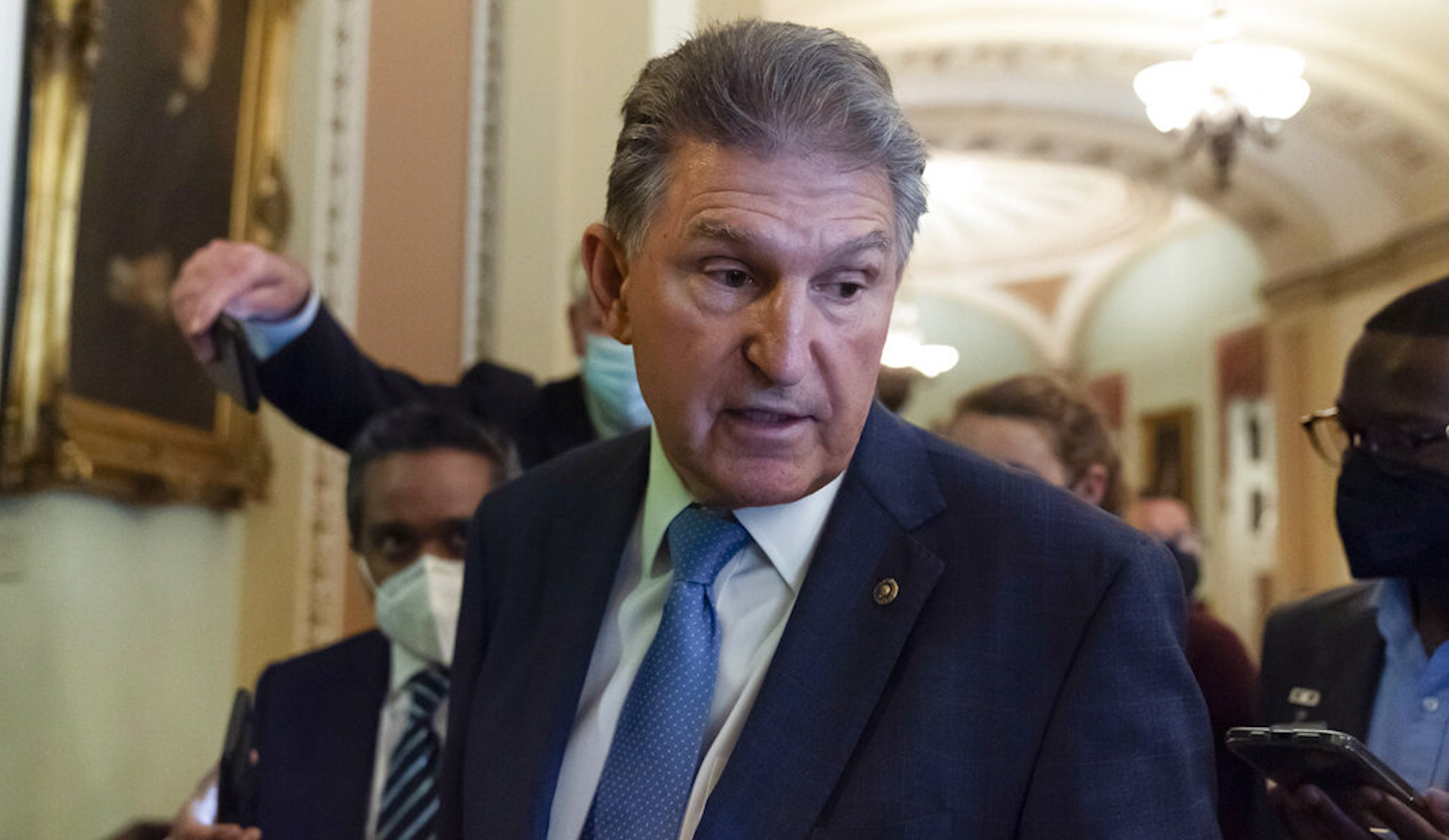 Manchin and Schumer drop permitting reform, clearing way for stopgap spending bill