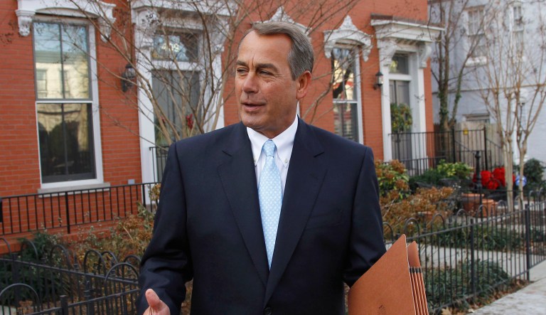 FILE - In this Jan. 5, 2011, file photo, U.S. Rep. John Boehner, R-Ohio, who was elected House Speaker later that day during the 112th Congress, walks out of his home on Capitol Hill in Washington. The prominent Washington-based law and lobbying firm Squire Patton Boggs said Tuesday, Sept. 20, 2016, that former House Speaker is joining the international firm as a strategic adviser to clients, focusing on global business development, but won't be a lobbyist.