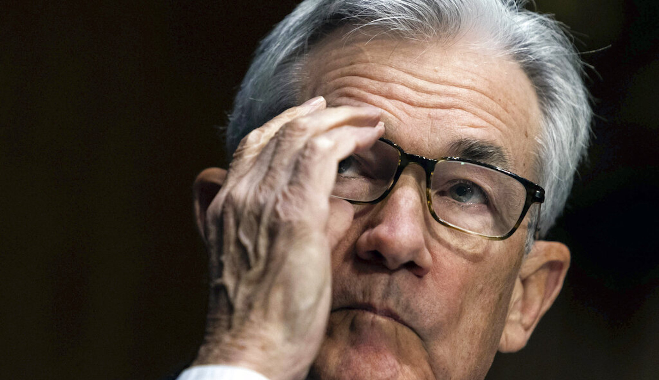 Powell pledges to bring down inflation during confirmation hearing