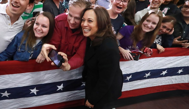 U.S. Senator Kamala D. Harris, D-California, pauses for a selfie with supporters while working the crowd after her speech while holding a campaign rally at Morehouse College on Sunday, March 24, 2019, in Atlanta.