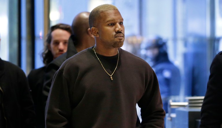 Kanye West enters Trump Tower in New York, Tuesday, Dec. 13, 2016.