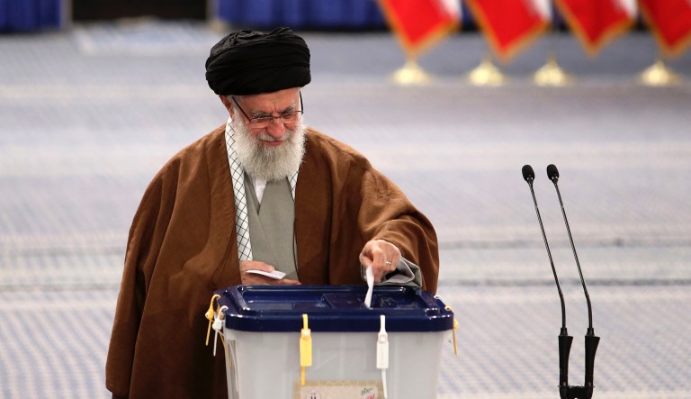 In this picture released by the official website of the office of the Iranian supreme leader, Supreme Leader Ayatollah Ali Khamenei casts his ballot in the parliamentary elections, in Tehran, Iran, Friday, Feb. 21, 2020. Iranians began voting for a new parliament Friday, with turnout seen as a key measure of support for Iran's leadership as sanctions weigh on the economy and isolate the country diplomatically.