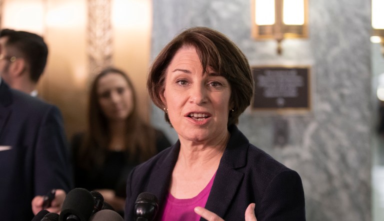 Sen. Amy Klobuchar, D-Minn., a member of the Senate Judiciary Committee, speaks to reporters during a break from testimony by Christine Blasey Ford on Capitol Hill in Washington, Thursday, Sept. 27, 2018.