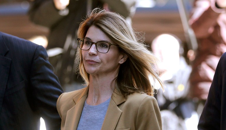 Actress Lori Loughlin arrives at federal court in Boston on Wednesday, April 3, 2019, to face charges in a nationwide college admissions bribery scandal.