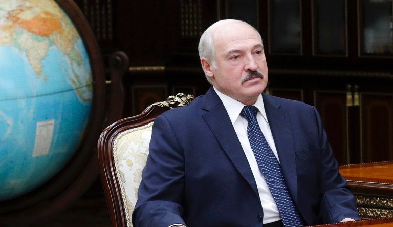 In this Monday, June 1, 2020 photo, Belarusian President Alexander Lukashenko meets with Valery Vakulchik, chief of the Belarusian state security service, KGB, in Minsk, Belarus.