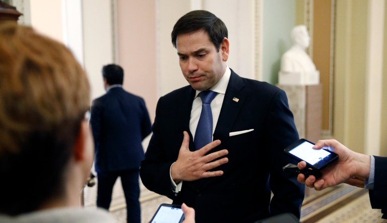 Sen. Marco Rubio, R-Fla., speaks to media on Capitol Hill in Washington, Thursday, March, 12, 2020, as he arrives for a briefing on the coronavirus outbreak.