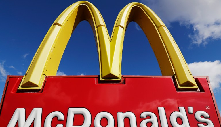 A McDonald's sign is displayed outside the fast food restaurant in Wheeling, Ill., Thursday, April 9, 2020. McDonald's executives took pay cuts as the coronavirus pandemic caused March sales to plunge.