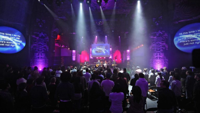 This Sunday Jan. 24, 2010 photo shows a band performing prior to Mosaic Church's pastor Erwin McManus' sermon at The Mayan night club in Los Angeles. Mosaic, a 3,000-member megachurch, is one of six finalists in the Doritos' "Crash the Super Bowl" challenge with a lighthearted spoof that plays off the resurrection of Jesus Christ.  