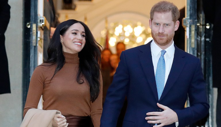 Britain's Prince Harry and Meghan, Duchess of Sussex leave after visiting Canada House in London, Tuesday Jan. 7, 2020, after their recent stay in Canada.                 