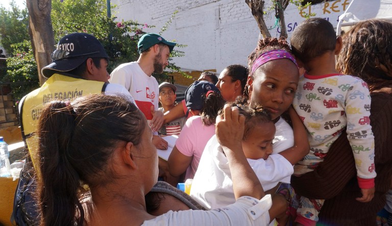 Central American migrants who attended the annual Migrants Stations of the Cross caravan for migrants' rights, receive food at a shelter in Tlaquepaque, Jalisco state, Mexico, Wednesday, April 18, 2018. The remnants of the migrant caravan that drew the ire of President Donald Trump were continuing their journey north through Mexico toward the U.S. border on Wednesday.