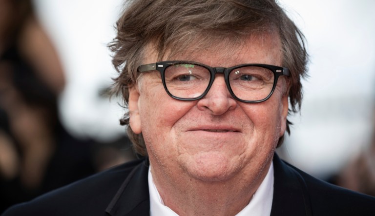 Michael Moore poses for photographers upon arrival at the awards ceremony of the 72nd international film festival, Cannes, southern France, Saturday, May 25, 2019.