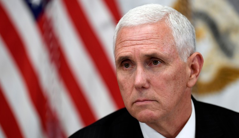 Vice President Mike Pence listens in the Vice President's Ceremonial Office on the White House complex in Washington, during a meeting with family members of the six Citgo executives currently detained in Venezuela, Tuesday, April 2, 2019.
