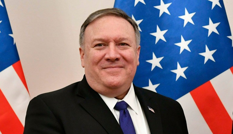 Hungarian Minister of Foreign Affairs and Trade Peter Szijjarto, right, shakes hands with US Secretary of State Mike Pompeo in the ministry in Budapest, Hungary, Monday, February 11, 2019. Pompeo is on an official visit to Hungary.
