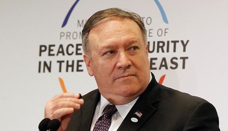 US Secretary of State Mike Pompeo looks towards Poland's Minister of Foreign Affairs Jacek Czaputowicz during a joint press conference, at the end of an international conference on promoting security in the Middle East that Poland co-hosted with the United States.  in Warsaw, Poland, Thursday, Feb. 14, 2019.