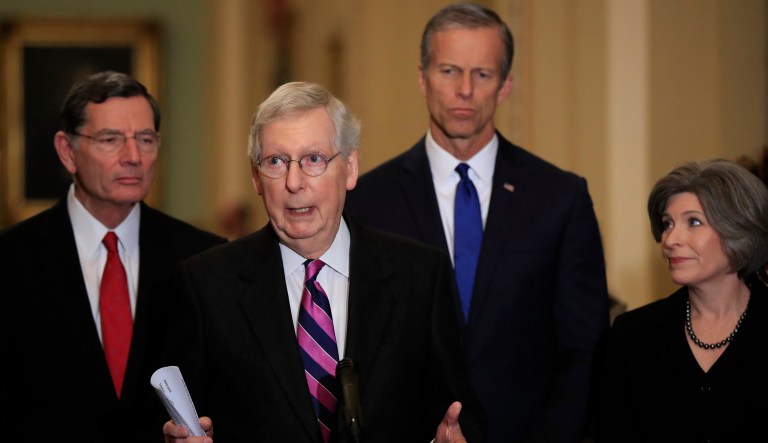 Senate Majority Leader Mitch McConnell, R-Ky., with, from left, Sens. John Barrasso, R-Wyo., McConnell, John Thune, R-S.D., and Joni Ernst, R-Iowa, speaks to reporters on Capitol Hill in Washington, Tuesday, Feb. 26, 2019.