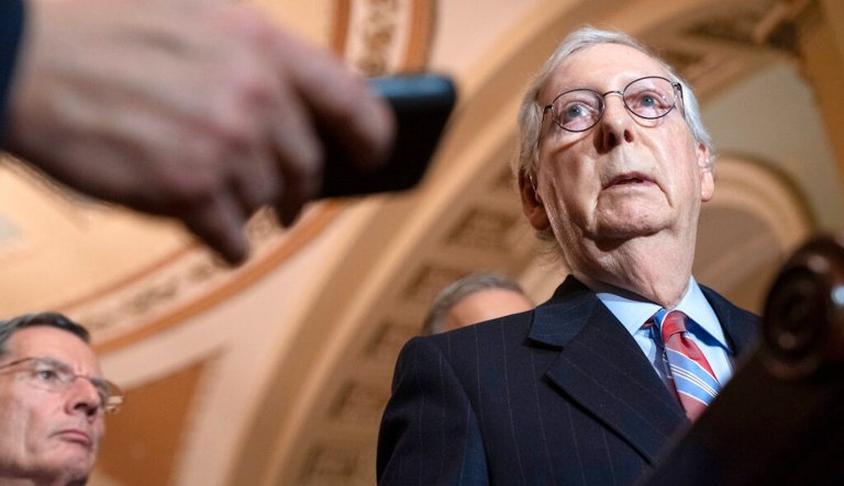 Senate Majority Leader Mitch McConnell, R-Ky., joined from left by Sen. John Barrasso, R-Wyo., Majority Whip John Thune, R-S.D., and Sen. Joni Ernst, R-Iowa, tells reporters he has secured enough Republican votes to start President Donald Trumpâs impeachment trial and postpone a decision on witnesses and documents Democrats want, at the Capitol in Washington, Tuesday Jan. 7, 2020.