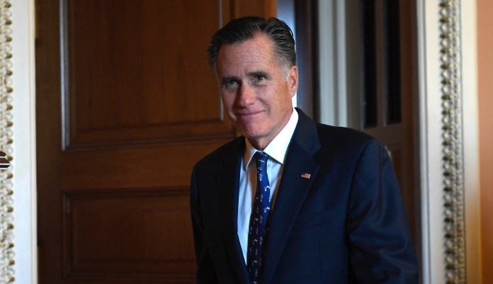 Sen. Mitt Romney, R-Utah, listens during a roundtable discussion at Intermountain Primary Children's Hospital with officials and health experts to receive an update on anti-vaping efforts Thursday, Oct. 10, 2019, in Salt Lake City.