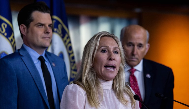 Rep. Marjorie Taylor Greene, accompanied by R-GA, Rep. Matt Gaetz, R-FL, and Rep. Louie Gohmert, R-TX, speaks at a news conference about pre trial conditions conditions for inmate at the Washington DC jail. on Capitol Hill, December 7 2021


