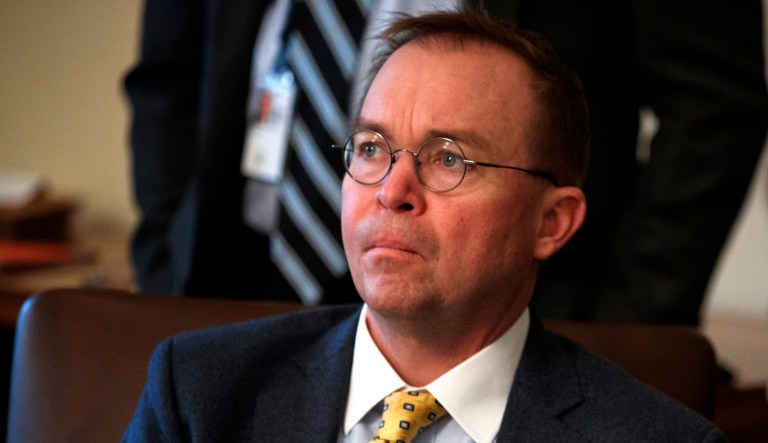 Acting White House chief of staff Mick Mulvaney listens as President Donald Trump speaks during a cabinet meeting at the White House, Tuesday, Feb. 12, 2019, in Washington.