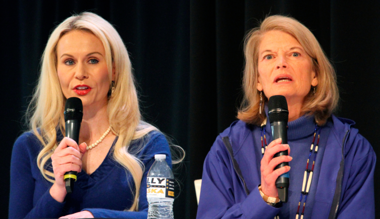 U.S. Sen. Lisa Murkowski, a Republican seeking re-election, answers a question during a candidate forum on Saturday, Oct. 22, 2022, in Anchorage, Alaska. She was joined by Rep. Kelly Tshibaka and Democrat Pat Chesbro.